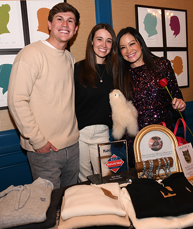 7. Robby Kendra and Gina Lizzo brought Allen Paca - sustainable, hand-finished sweaters, hats and socks items made from alpaca fiber at the event. Jen Su them in a photo op