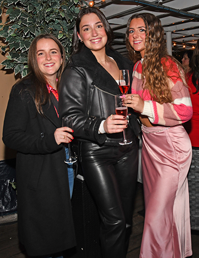 8. Megan Dougherty, Julia Evans and Amber Hickey toasted the event