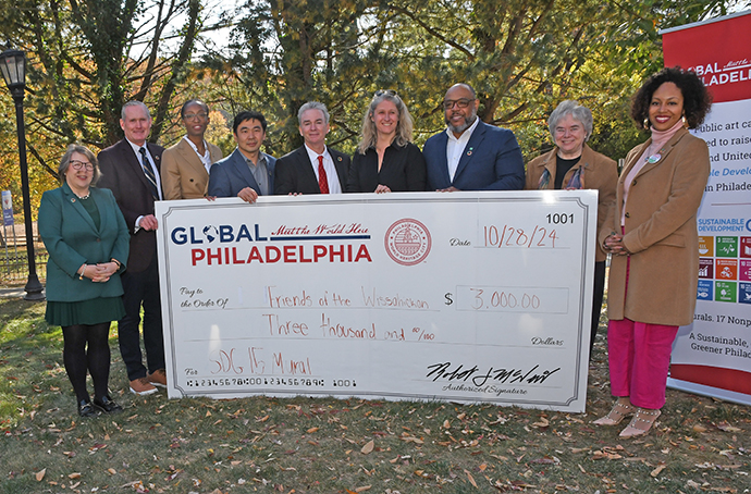 9. A check presentation followed remarks by officials representing Global Philadelphia, Friends of the Wissahickon, Chestnut Hill College, TD Bank, and the Philadelphia City Office