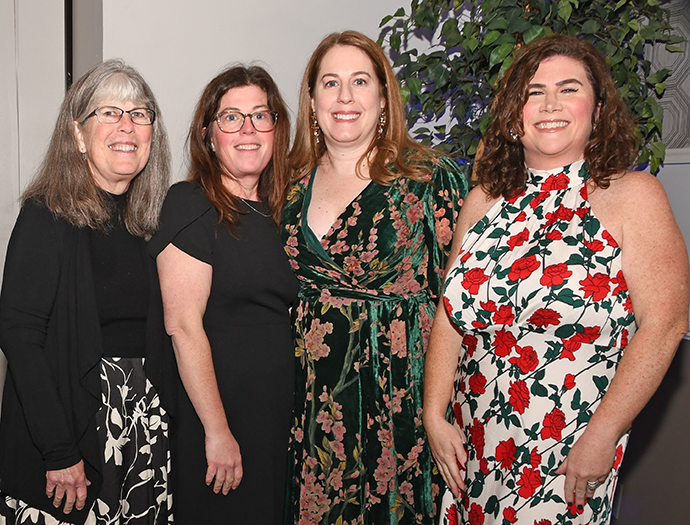  2. Charleen, Laura and Sarah Gribben paused for a photo with Shannon Bruno, CASA's Director of Development. Laura Gribben received the Advocate of the Year award 